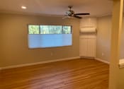 Thumbnail 3 of 7 - Unit Interior - Living Room