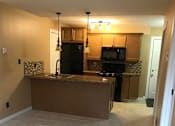 Thumbnail 3 of 9 - a look into the kitchen from the living room