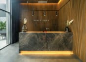 Thumbnail 3 of 31 - the lobby or reception area of a hotel with a marble reception desk
