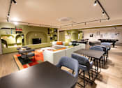 Thumbnail 3 of 7 - A room with a long table and chairs.