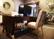 Thumbnail 16 of 53 - a desk with two monitors and a chair in a hotel room