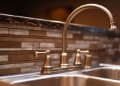 Thumbnail 48 of 53 - a close up of a kitchen sink with a faucet