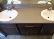 Thumbnail 49 of 53 - a bathroom with two sinks and a mirror