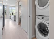 Thumbnail 59 of 59 - a washer and dryer in a house