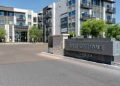 Thumbnail 46 of 49 - a view of the main entrance to slate scottsdale apartments in the background