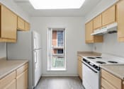 Thumbnail 10 of 12 - A kitchen with a window overlooking a balcony at Pin Yuen, Sacramento