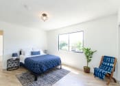 Thumbnail 3 of 8 - One Bedroom Staged Bedroom