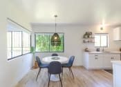 Thumbnail 7 of 8 - One Bedroom Dining Area