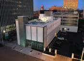 Thumbnail 15 of 28 - an aerial view of a building in a city at night