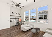 Thumbnail 20 of 31 - an open living room with a kitchen and a large window at Zora Encanto, Arizona