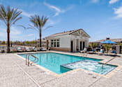 Thumbnail 5 of 31 - our resort style swimming pool is next to our clubhouse at our apartments on the strip at Zora Encanto, Phoenix
