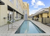 Thumbnail 35 of 35 - a swimming pool in the middle of a building