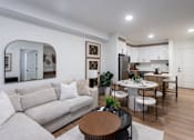 Thumbnail 22 of 31 - Living Area With Kitchen at The Pointe at Riverview, Edmonton, T6M 3H4
