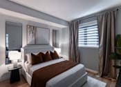 Thumbnail 19 of 31 - Large Bedroom at The Pointe at Riverview, Alberta