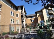 Thumbnail 4 of 10 - a picture of an apartment complex with a slide