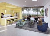 Thumbnail 5 of 7 - A modern kitchen with a yellow wall and people standing and sitting around it.