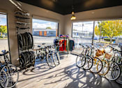 Thumbnail 12 of 16 - A bike shop with many bicycles on display.