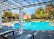 Thumbnail 22 of 40 - Relaxing Pool Area With Sundeck at The Lakes, Allentown, PA