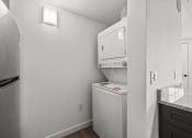 Thumbnail 76 of 76 - a small laundry room with a washer and dryer  at The Icon, Richmond, VA 23230