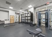 Thumbnail 46 of 76 - a fully equipped fitness room with free weights and other equipment  at The Icon, Richmond, VA 23230