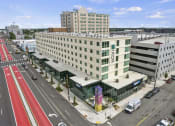 Thumbnail 39 of 76 - a large white building with a sign that says motel 6 on the side of it at The Icon, Richmond, VA 23230