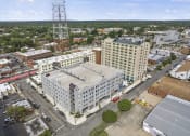 Thumbnail 27 of 76 - a view from the air of a large white building with a flat roof at The Icon, Richmond, VA 23230