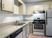 Thumbnail 13 of 16 - Bright Kitchen at The Benton Apartment Homes, Hoover