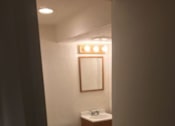Thumbnail 8 of 8 - a small bathroom with a toilet and a sink