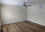 Thumbnail 6 of 11 - Room with wooden floor at Brookside Manor, West Virginia