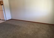 Thumbnail 13 of 17 - Bedroom with wooden flooring and window at Dutch Hills Terrace Apartments, Parkersburg, 26104