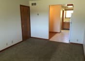 Thumbnail 11 of 17 - Bedroom with wooden floor at Dutch Hills Terrace Apartments, Parkersburg, WV, 26104