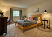 Thumbnail 5 of 19 - A bedroom with