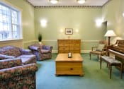 Thumbnail 45 of 57 - a living room filled with furniture and a piano