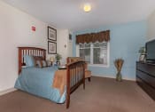 Thumbnail 55 of 57 - a room with a rainbow striped wall and a carpet and a bench