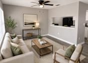 Thumbnail 7 of 11 - A living room with a couch, chair, and a coffee table.