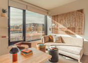Thumbnail 8 of 36 - Living room at Scout Living, powered by Placemakr Apartments, Atlanta