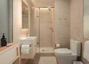 Thumbnail 7 of 36 - a small bathroom with a toilet and a shower at Scout Living, powered by Placemakr Apartments, Georgia 30308