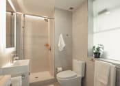 Thumbnail 12 of 36 - a bathroom with a shower and a toilet and a sink at Scout Living, powered by Placemakr Apartments, Atlanta, GA, 30308