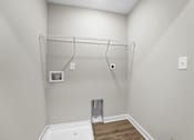 Thumbnail 18 of 36 - a white bathroom with a tub and a shelf on the wall