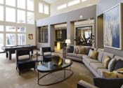 Thumbnail 17 of 25 - a living room filled with furniture and a pool table