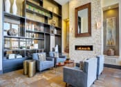 Thumbnail 1 of 25 - a living room filled with furniture and a fireplace
