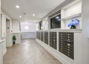 Thumbnail 18 of 28 - a room with a bunch of mailboxes on the wall
