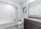 Thumbnail 18 of 30 - a bathroom with a toilet sink and bathtub at RockVue, Broomfield, CO, 80021