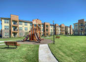 Thumbnail 10 of 28 - our apartments showcase a beautiful playground at Retreat at Shadow Creek Ranch Apartments, Woodburn, 77584