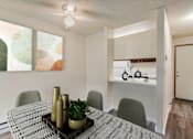 Thumbnail 6 of 24 - the preserve at ballantyne commons apartment dining room and kitchen at Eagles Landing Apartments, Everett, 98204