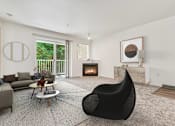 Thumbnail 19 of 22 - a living room with a black chair and a fireplace at Sage Apartments, Everett, WA, 98204