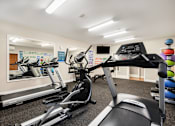 Thumbnail 8 of 22 - exercise equipment in the gym at meridian pointe apartments at Sage Apartments, Everett, 98204