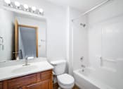 Thumbnail 36 of 60 - a bathroom with a sink toilet and a bath tub