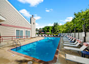 Thumbnail 27 of 60 - the reserve at city center amenities include a pool and lounge chairs