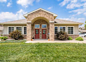 Thumbnail 2 of 27 - a home with a red door